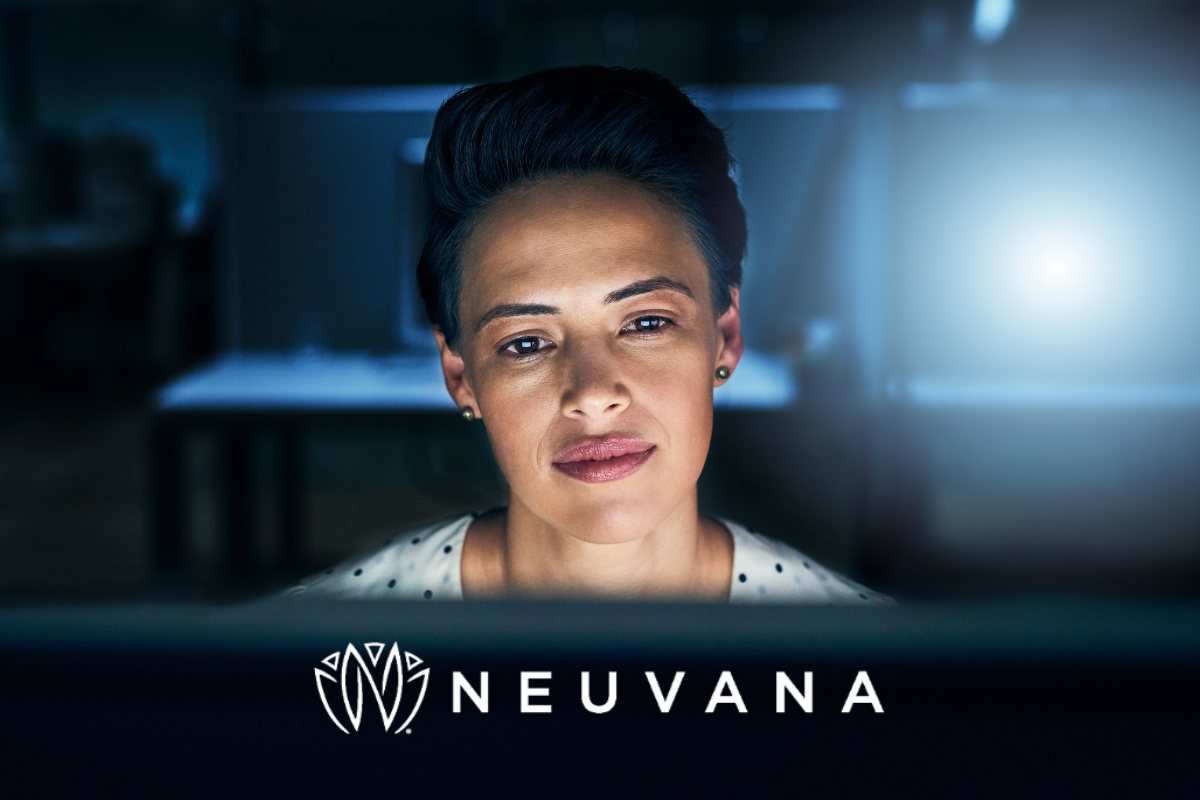 Woman staring at a computer screen