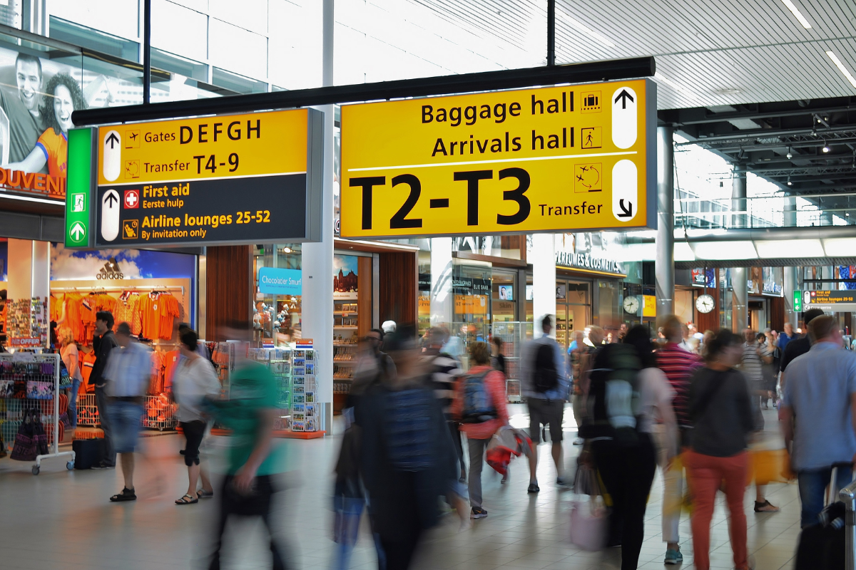 blurry photo of a busy and crowded airport