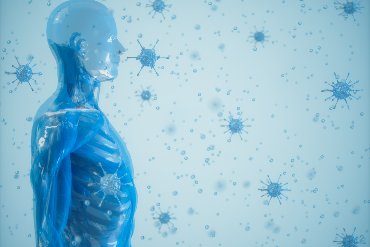 photo of an AI genrated human in shades of blue with globes of bacteria in the air meant to show the human body's immune system