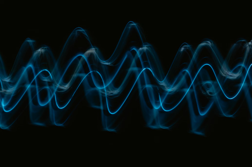 blue sound waves on a black background